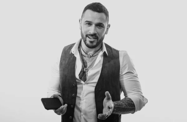 Mafia boss. Guy handsome mafia boss hold smartphone. Business call. Man well groomed rich fashionable macho. Clothes and accessories. Fashion macho. Mobile conversation. Bearded guy white background.