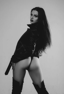 Buttocks of girl in erotic pants. woman with big buttocks. Big ass. sensual woman with erotic sexy body. passion girl with long hair. Weight loss. At a loss. Never enough to be with her. erotic game.