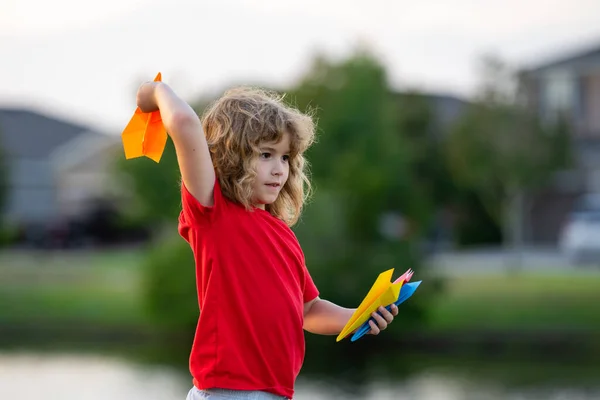 Little Boy Hold Paper Planes Toy Airplane Children Hands Outdoor — Stock Photo, Image