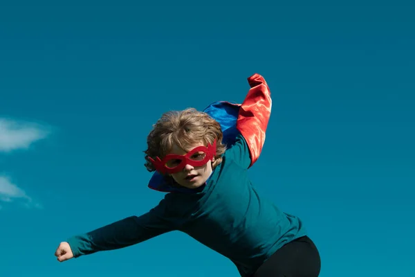 stock image Excited child boy dressed like superhero. Super hero concept