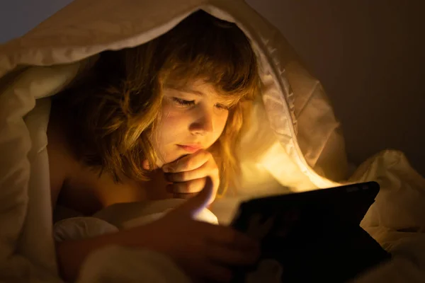 Kid Boy Lying Bed Surfing Internet Tablet Dark Room Child — Stock Photo, Image