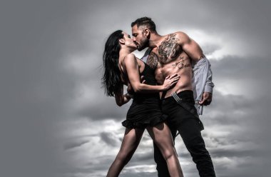 Romantic sexy couple kissing. Sensual couple in love kissing. Passion, dating and love. Young beautiful sexy lovers kissing. Sensual relationship. Sexy elegant couple in the tender passion kissing