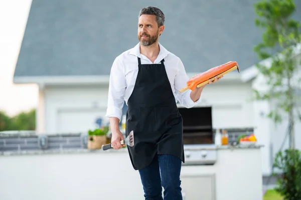 Man Cook Apron Grilling Barbequing Salmon Fish Garden Handsome Man — Stock Photo, Image