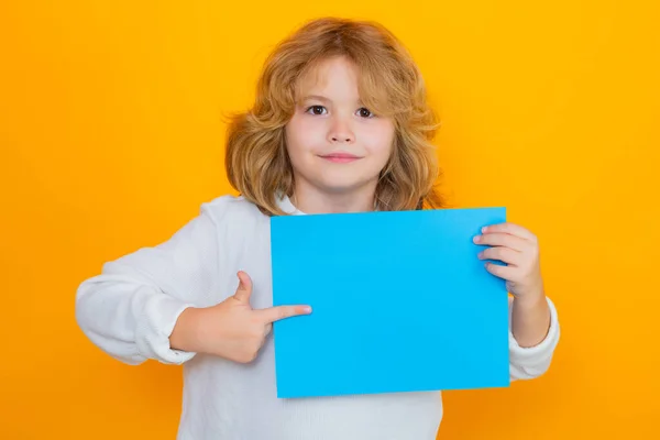 Child Showing Index Finger Sheet Paper Isolated Yellow Background Portrait — Stock Photo, Image