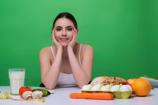 Diet plan, diet menu or program. Woman eat vegetable and healthy food. Weight loss detox diet. Healthy food and dieting concept. Weight loss. Low calorie dieting with healthy food. Raw healthy food