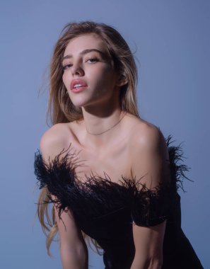 Sexy woman in fashion dress in studio. Sensual young woman posing with sexy slim body. Beautiful sexy model. Beauty female face. Sensual girl, sexy model portrait. Fashion and vogue