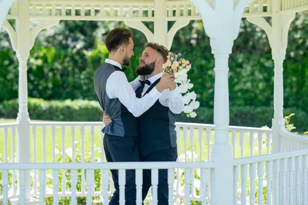Gay couple dancing on wedding. Romantic men same sex marriage. Gay couple wedding. Homosexual gay couple, LBGT couple at wedding ceremony, LGBTQ