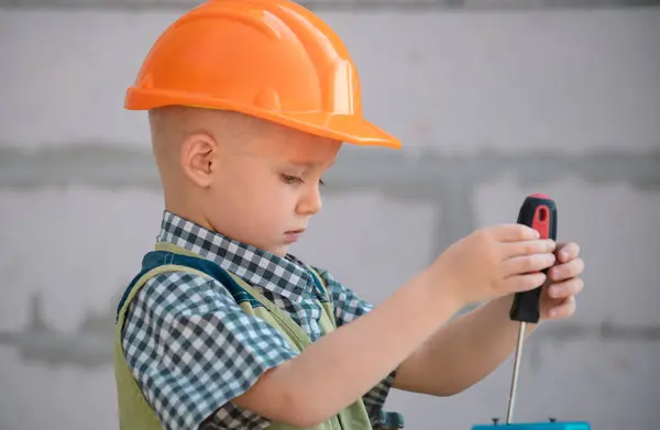 Kid Boy Twists Bolt Screwdriver Child Repairman Repair Tool Child — Photo