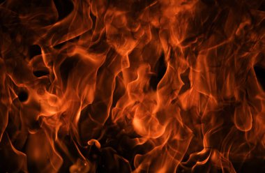 Texture of fire on a black background. Abstract fire flame background, large burning fire clipart