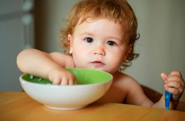 Portrait Funny Little Baby Boy Eating Plate Holding Spoon Closeup — Stock Photo, Image