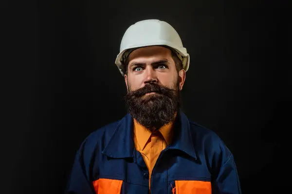 Worker in hardhat. Construction Worker with helmet. Worker in helmet at building. Portrait of Engineer Builder with Helmet. Worker from building site. Workers helmet and uniform