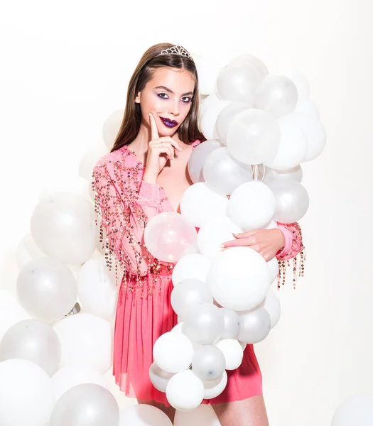 Beautiful funny girl with gift balloons, birthday celebration concept