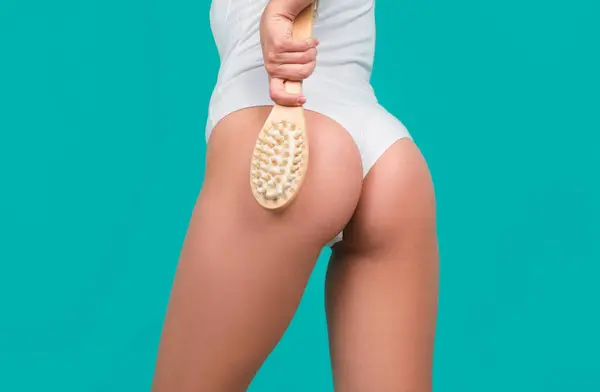 Woman sexy buttocks without cellulite. Laser removal treatment. Anti-cellulite body massage for leg and butt. Spa and wellness, plastic surgery, body care, aesthetic cosmetology. Beautiful sexy hips