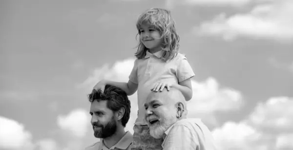 Men generation portrait of grandfather father and son child. Fathers day. Men in different ages of young father cute child son and old grandfather