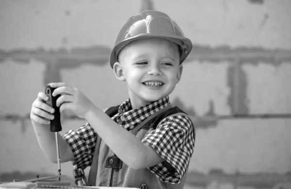 Little Boy Holding Screwdriver Happy Smiling Kid Twists Bolt Screwdriver — Stock Photo, Image