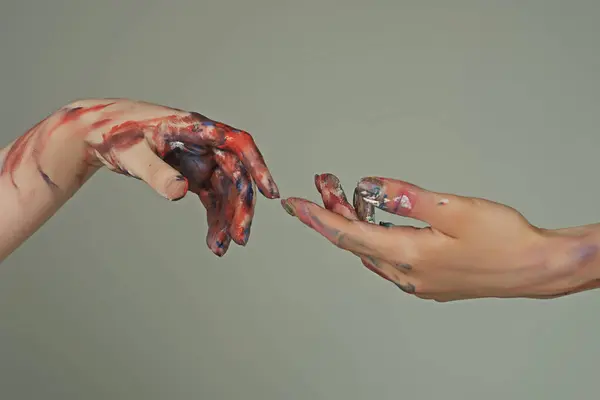 Painted hands. Reach hand. Sensual touch fingers. Two hands trying to touch. Hands of man and woman reaching to each other. Hand try to touch. Fingers touch each other. Sensual arm