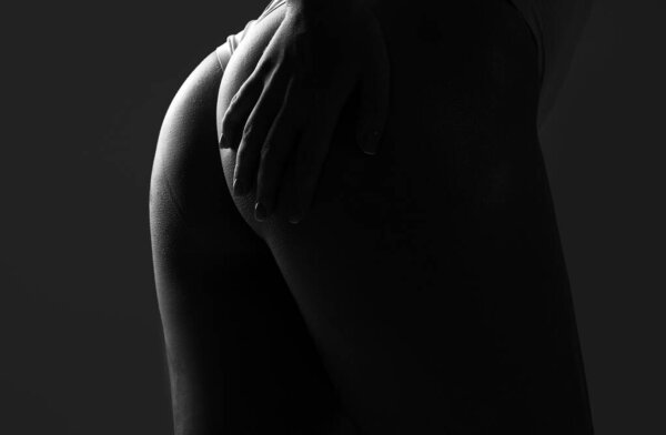 Closeup butt. Panties in sexy womans body. Lingerie model. Sexy ass in erotic lingerie. Sexy woman pulls underpants. Beautiful butt in sensual underwear. Female ass, huge buttocks