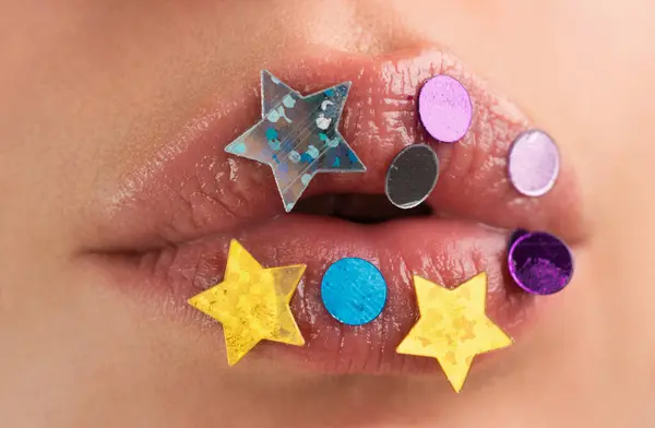 Glitter lip makeup. Creative lips with sparkles. Art design