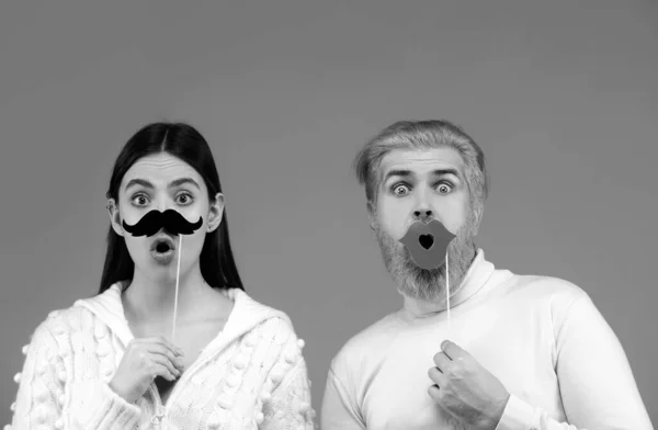Gender discrimination and sexism. Male and female characters in gender symbols. Couple of woman with moustache and man with red lips. Identity transgender, gender stereotypes