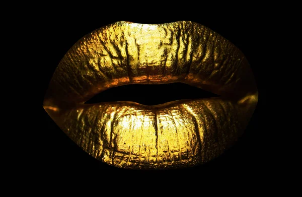 Beautiful lipped woman gold mouth. Sensual golden lips, sexy lip. Golden gloss lipstick