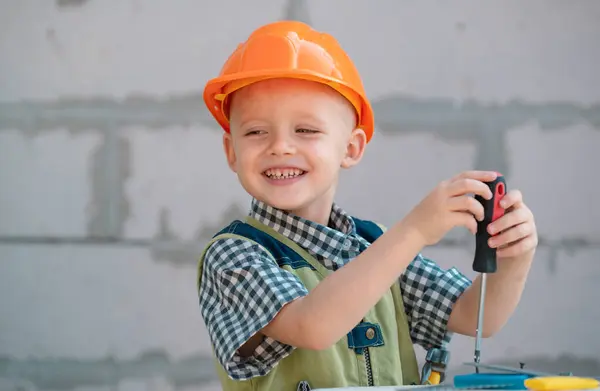 Little Boy Holding Screwdriver Happy Smiling Kid Twists Bolt Screwdriver — Stock Photo, Image