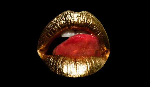 Lips icon. Shine golden style for sexy lips. Gold paint on lip. Golden sensual woman mouth. Metallic creative art lipstick close up. Gold concept. Isolated woman golden mouth with tongue out