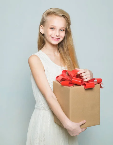 happy blond girl. natural makeup. beauty hairdresser salon. happy birthday. girl with big birthday present. gift box, boxing day. shopping sale. retro blonde teen. Vintage. Thanks for your purchase.
