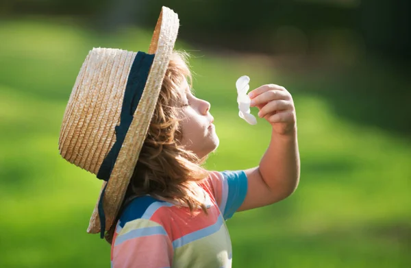 Caucasian Child Portrait Close Kids Straw Hat Smelling Plumeria Flower — Foto Stock