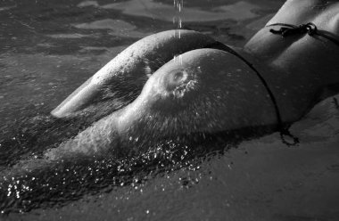 Luxury ass and summer relax concept. Sensual attractive young womans buttocks in hot sexy bikini. Perfect body