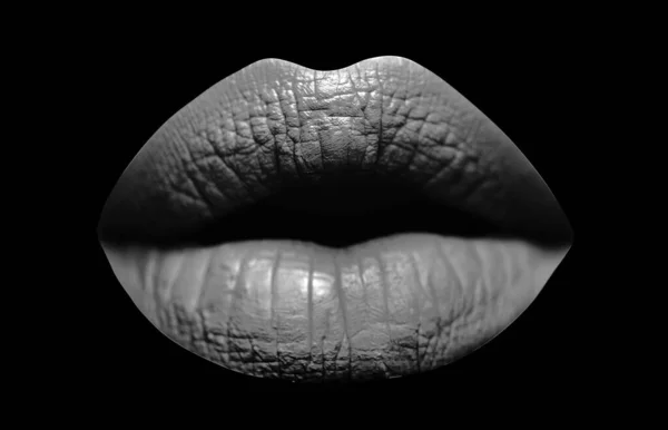 Red lips. Sensual lips in black background. Sexy texture lips and matte lipstick. Purple matt lipstick. Lip isolated