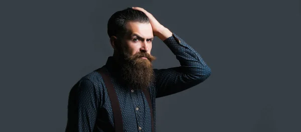 Beard man with classic long beard, bearded gay. Barber, barbershop concept. Mustache retro men. Banner for website with text copy space