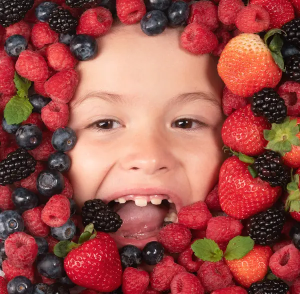 Healthy food for kids. Berries mix of strawberry, blueberry, raspberry, blackberry for children