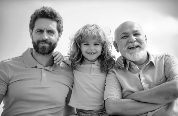 Men generation portrait of happy grandfather father and son child. Fathers day. Men in different ages
