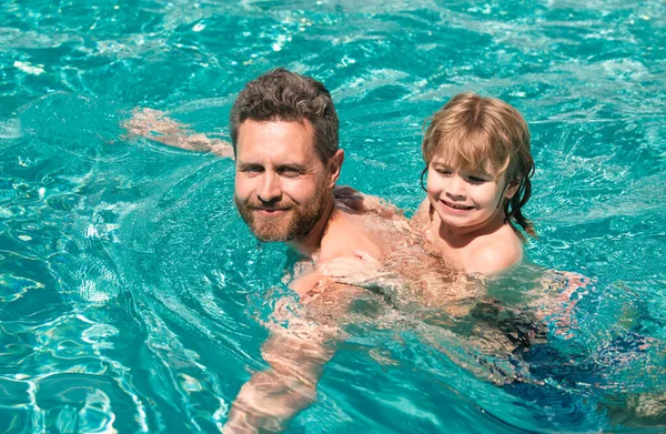 Father and son swimming in pool, summer family. Swimming lessons. Weekeng for child