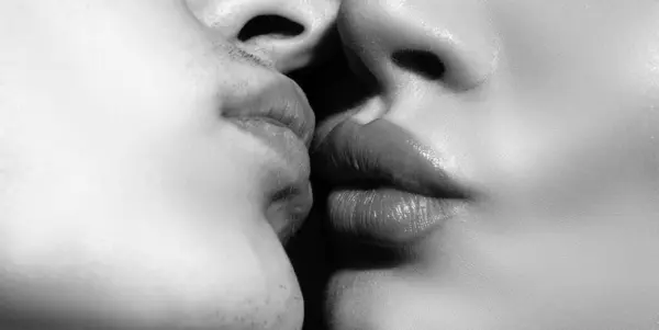 Sensual kiss close up. Sexy kiss. Oral pleasure. Couple girls kissing lips close up. Sensual lip touch. Passion and sensual