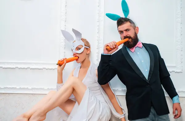 Sexy easter egg couple. Smile easter. Sexy bunny rabbit couple. Easter bunny dress