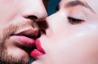 Sensual passionate couple kissing lips. Closeup of couple mouths kiss clipart