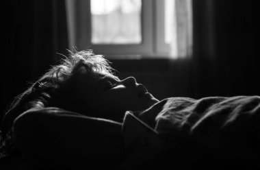 Little boy child sleeping in the bed. Quiet sleep