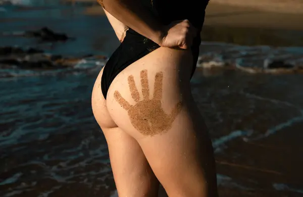 Closeup Womans Butt Sand Hand Prints Perfect Womans Body Sexy — Zdjęcie stockowe