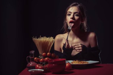 Sexy woman eat Spaghetti. Sensual woman enjoying pasta. Seductive Spaghetti. Sensual bite. Love Italian cuisine. Savor Spaghetti. Sensual eat and lick. Sensual girl for Italian restaurant menu banner clipart
