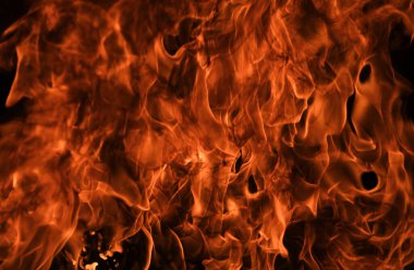 Ateş hareketinin soyut dokusu soyut. Yanan ateş, yanan arka plan