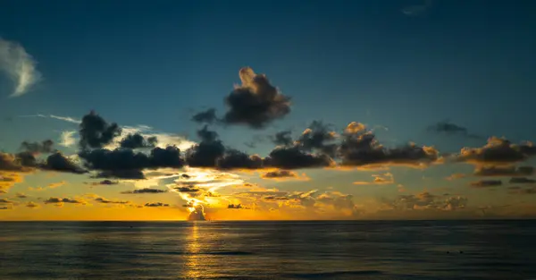 Dramatic sunset sky. sea. Calm sea with sunset sky through the clouds over. Sunset ocean and sky background. Tranquil seascape. Horizon over the sunset sea water. Calm sea with sunrise sky