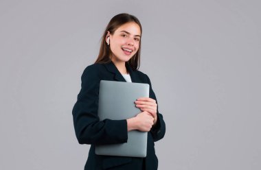 Charming positive lady hold laptop, isolated background. Young secretary
