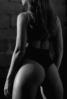 Lingerie model in sexy panties on booty ass. Lingerie bikini model in sexy panties. Lace black lingerie, sexy buttocks. Beautiful girl, fashion model. Fashion lady. Sexy clothes