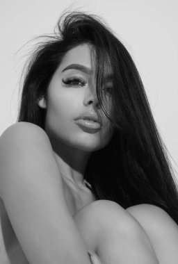 Sexy attractive woman posing with slim sexy body. Beautiful sexy model portrait. Beauty woman face. Attractive sensual girl