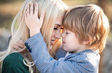 Mother hug. Portrait of mother and child hugging. Mother hugging and embracing son. Mothers day, love family. Mother and child with hugging tenderness. Mothers hugging child, cuddle warm hug