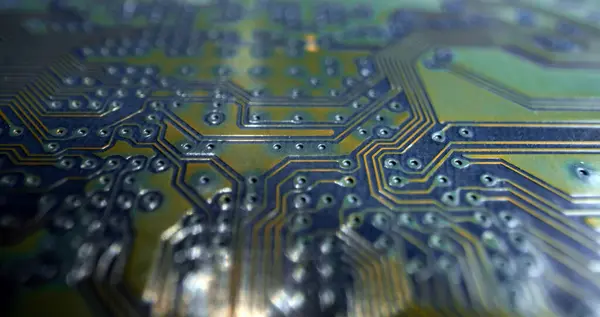 stock image Circuit board. Technological electronic plate with roads and other components, selective focus. Technology background, electronics texture