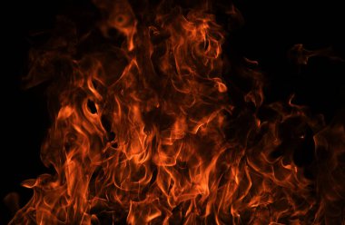 Siyah arka planda ateş dokusu. Soyut yangın arka planı, büyük yanan ateş