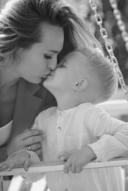Mothers love. Closeup portrait of mother and child kissing. Mother hugging and embracing son. Mothers day, love family. Mother and child with tenderness. Mothers kiss child, cuddle warm relationships