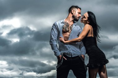 Sensual passionate couple enjoying tenderness and intimacy. Young sexy couple. Romantic lovers. Portrait of a sensual sexy couple in love. Young sexy couple embracing. Loving coupl hugging. Sexy